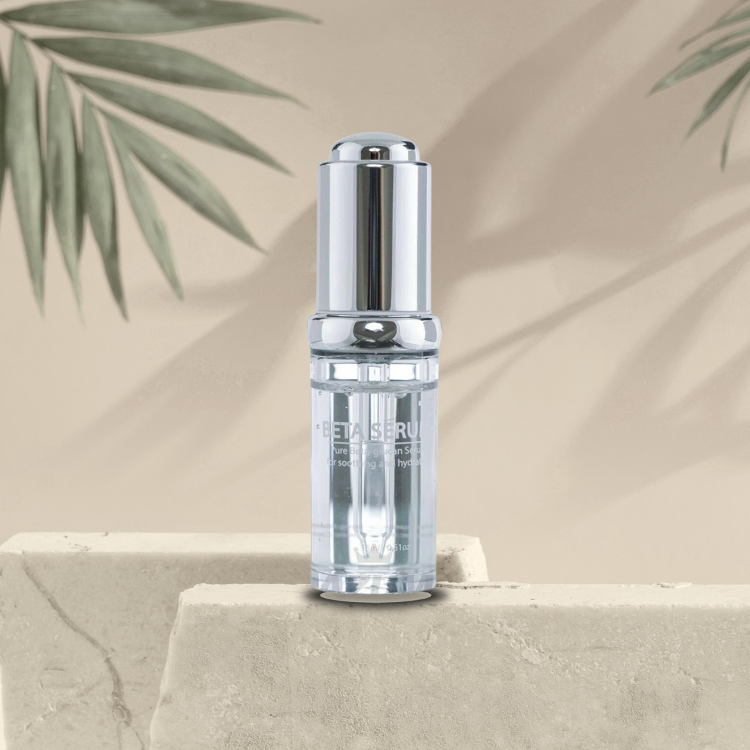 Beta Glucan serum bottle on a stone surface with a natural background